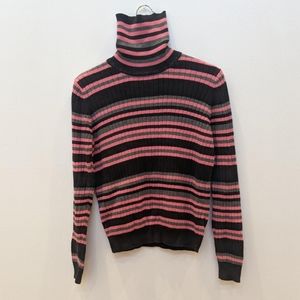 pink and black turtle neck